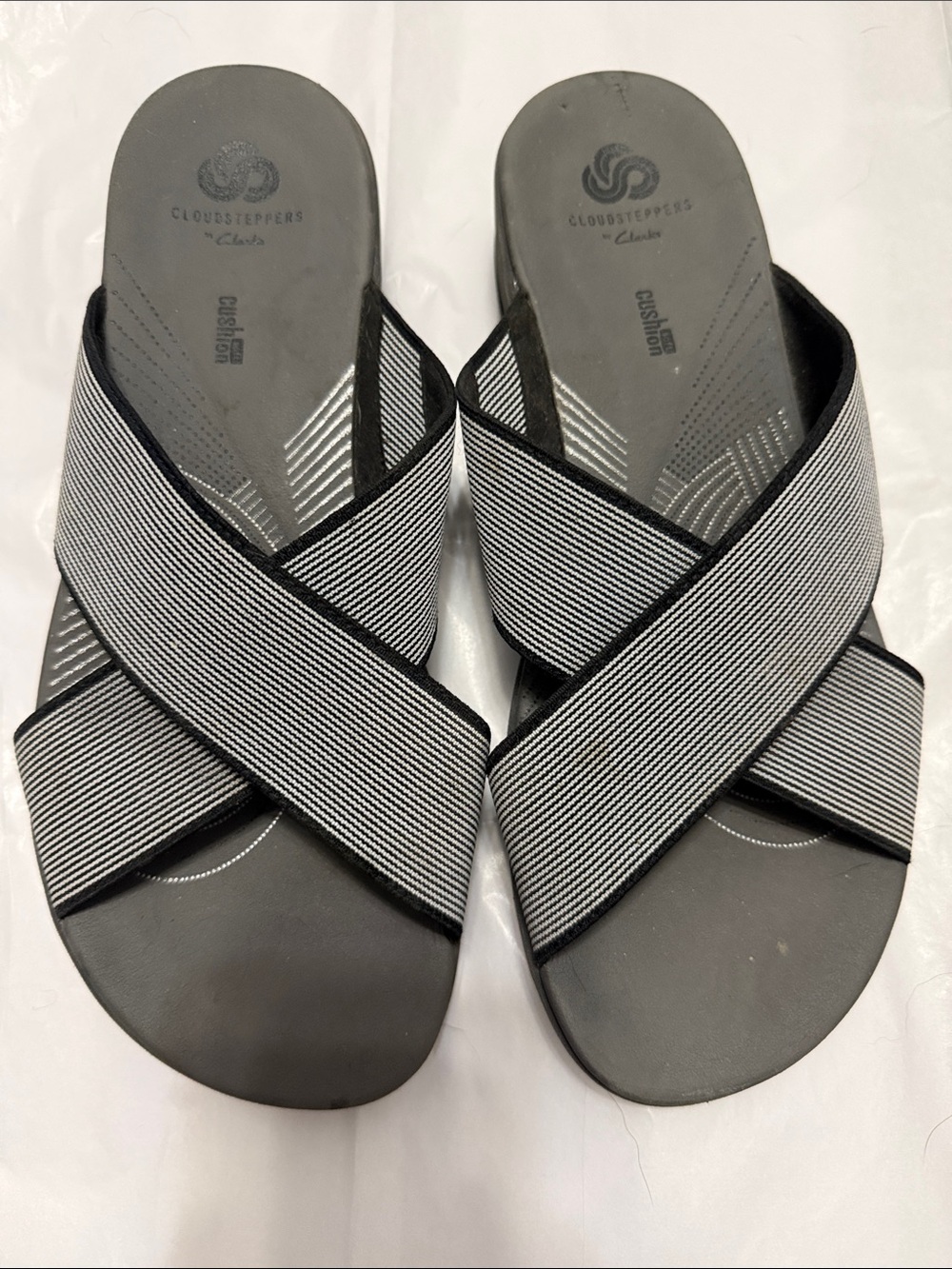Clarks Black and White Crisscross Slide Sandals